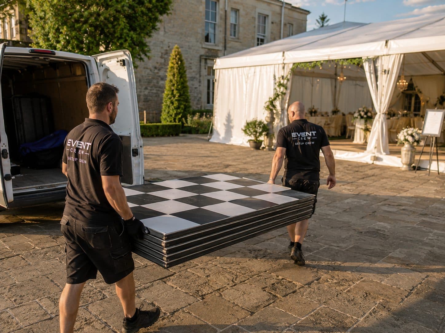 Crew preparing dance floors rentals for delivery